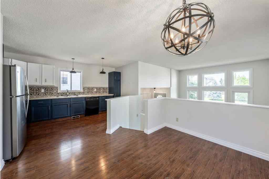 MLS® A2256226 - 680 Macewan Drive NW in MacEwan Glen Calgary, Residential