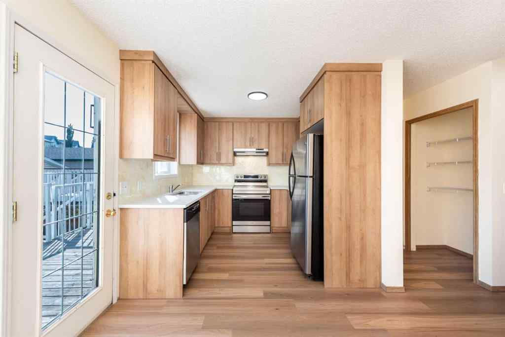 MLS® A2256233 - 216 Hidden Hills Road NW in Hidden Valley Calgary, Residential