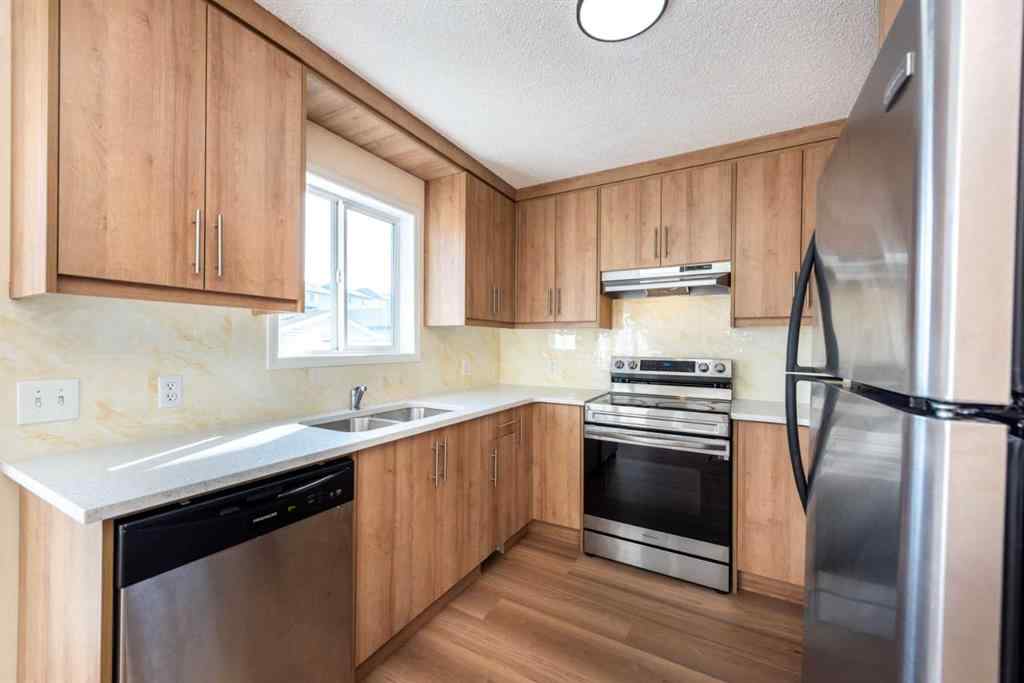 MLS® A2256233 - 216 Hidden Hills Road NW in Hidden Valley Calgary, Residential