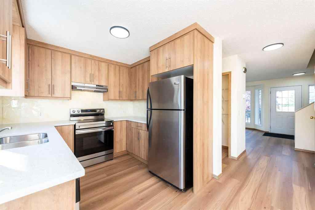 MLS® A2256233 - 216 Hidden Hills Road NW in Hidden Valley Calgary, Residential