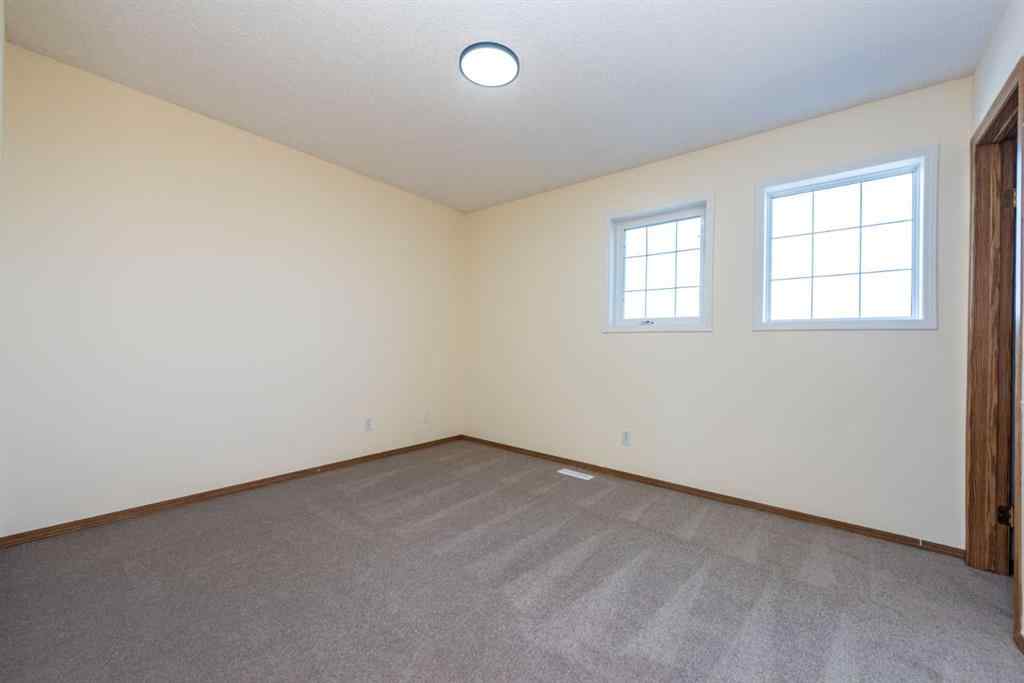 MLS® A2256233 - 216 Hidden Hills Road NW in Hidden Valley Calgary, Residential