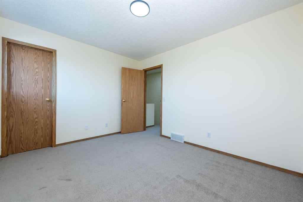 MLS® A2256233 - 216 Hidden Hills Road NW in Hidden Valley Calgary, Residential