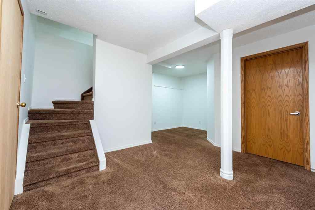 MLS® A2256233 - 216 Hidden Hills Road NW in Hidden Valley Calgary, Residential