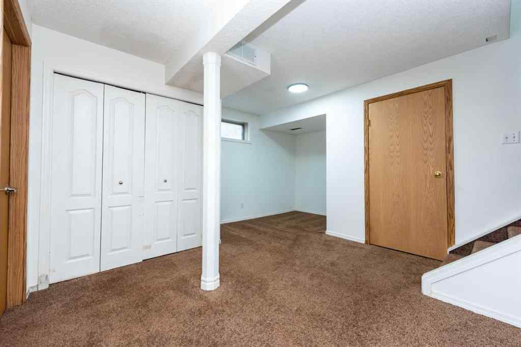 MLS® A2256233 - 216 Hidden Hills Road NW in Hidden Valley Calgary, Residential