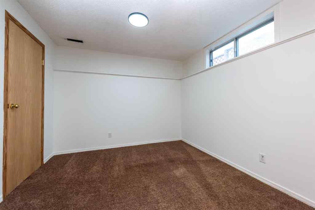 MLS® A2256233 - 216 Hidden Hills Road NW in Hidden Valley Calgary, Residential