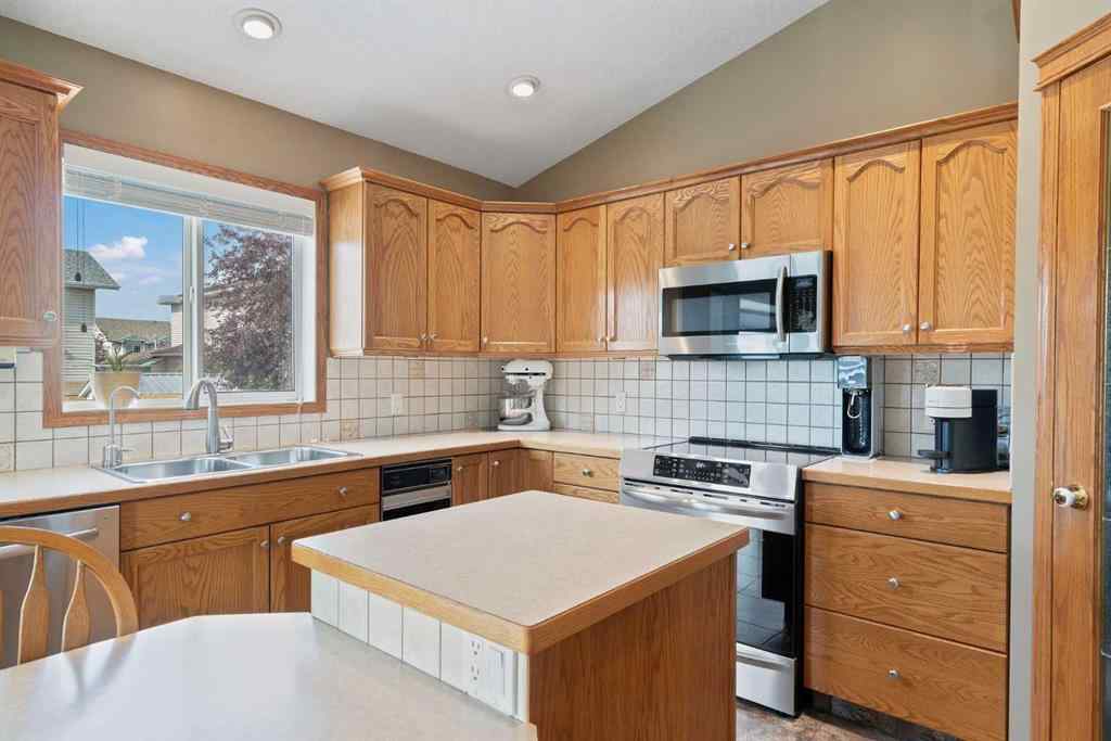 MLS® A2256242 - 65 Canoe Circle SW in Canals Airdrie, Residential