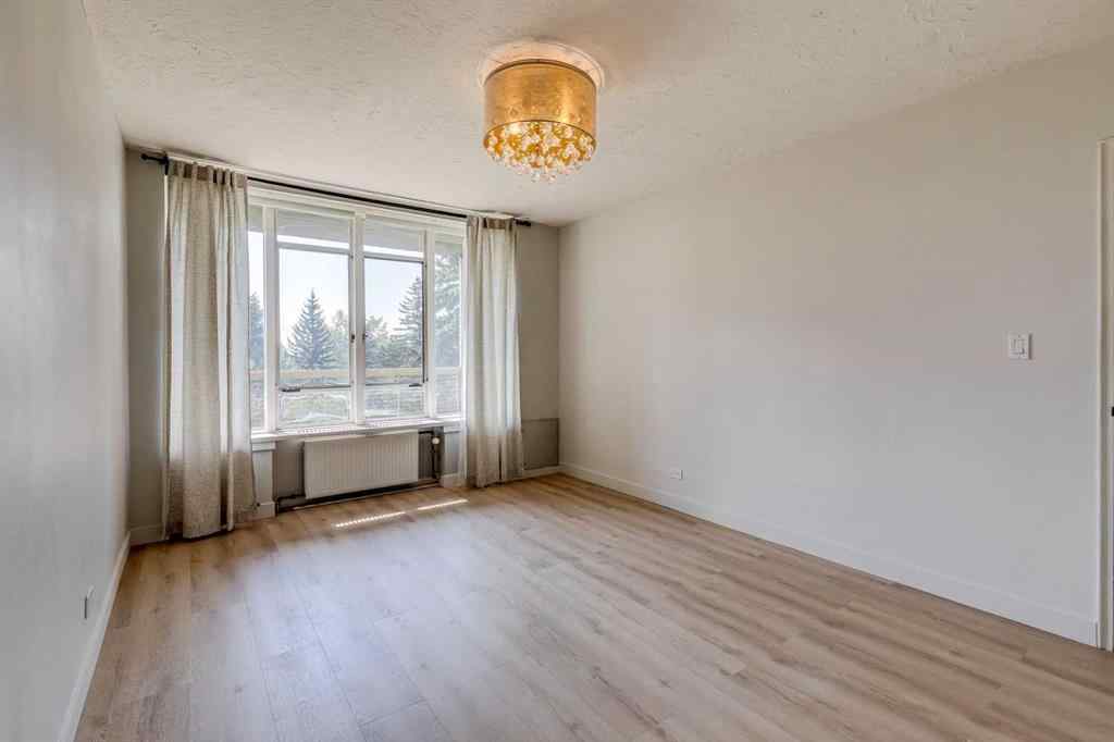 MLS® A2256244 - Unit #408 3316 Rideau Place SW in Rideau Park Calgary, Residential