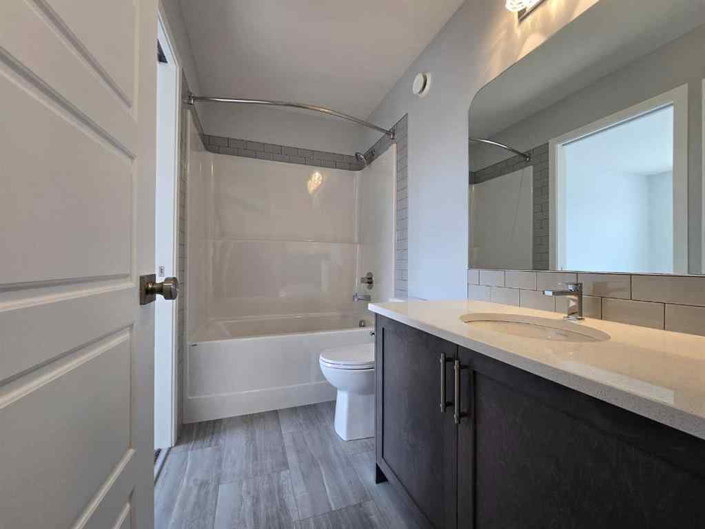 MLS® A2256248 - 512 Baywater Manor SW in Bayside Airdrie, Residential
