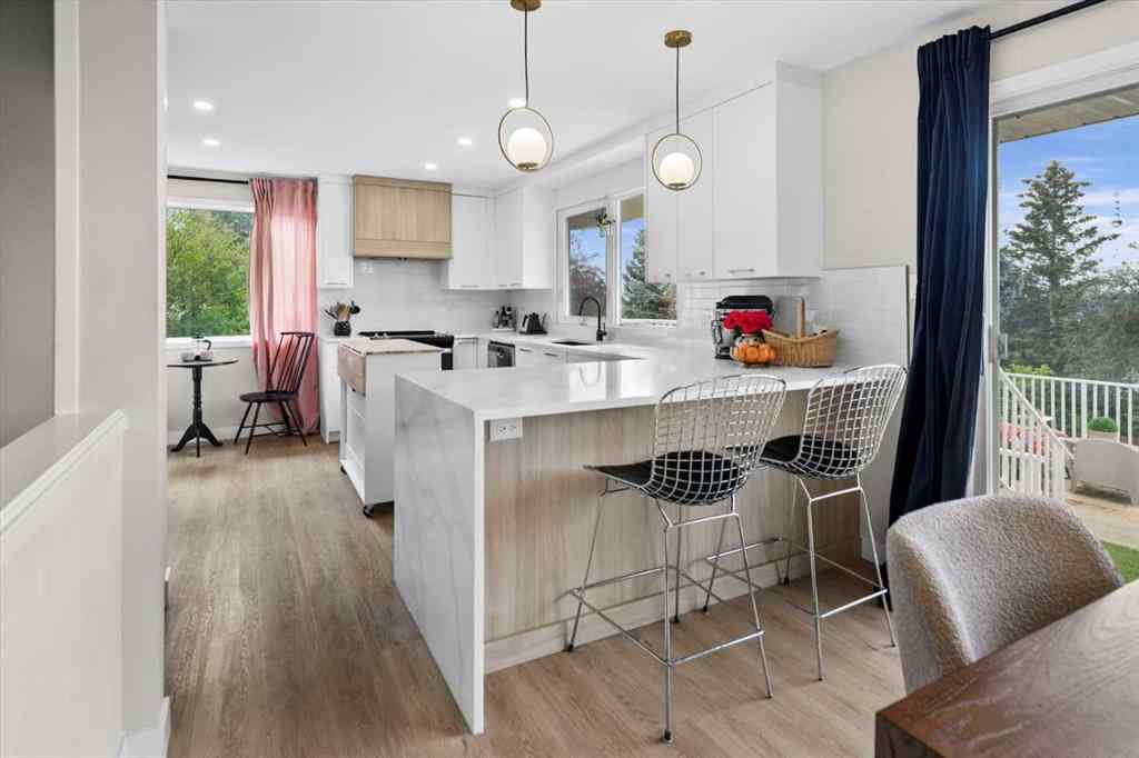 MLS® A2256250 - 7707 67 Avenue NW in Silver Springs Calgary, Residential