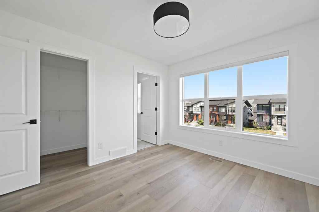 MLS® A2256274 - Unit #709 525 River Heights Drive  in River Song Cochrane, Residential