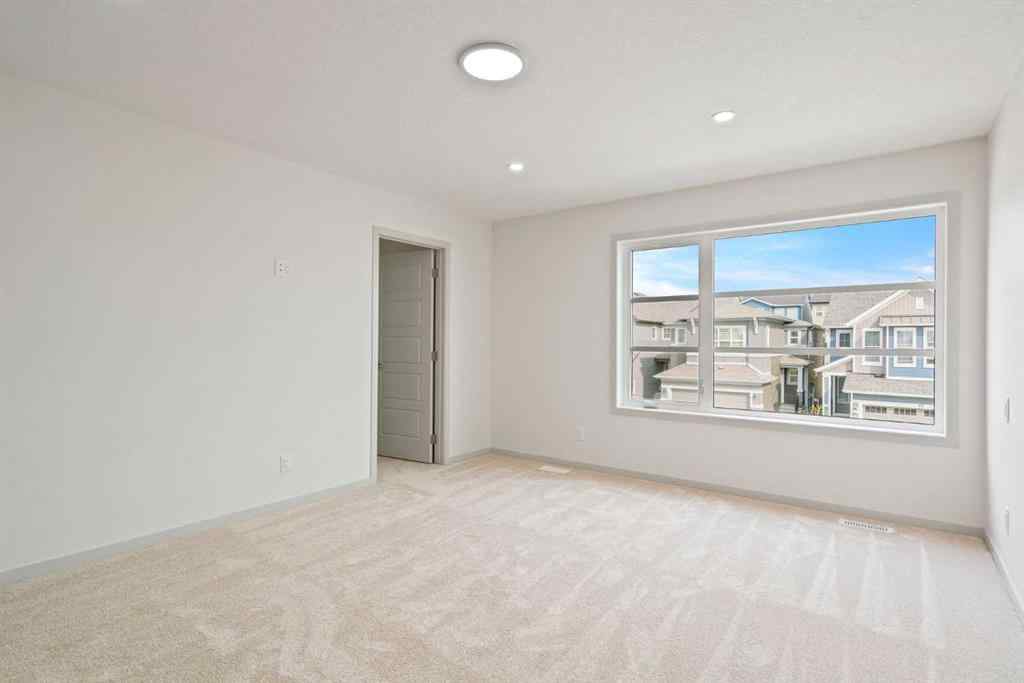 MLS® A2256280 - 31 Lucas Passage NW in Livingston Calgary, Residential