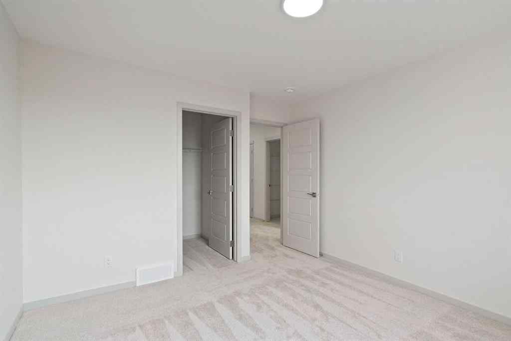 MLS® A2256280 - 31 Lucas Passage NW in Livingston Calgary, Residential