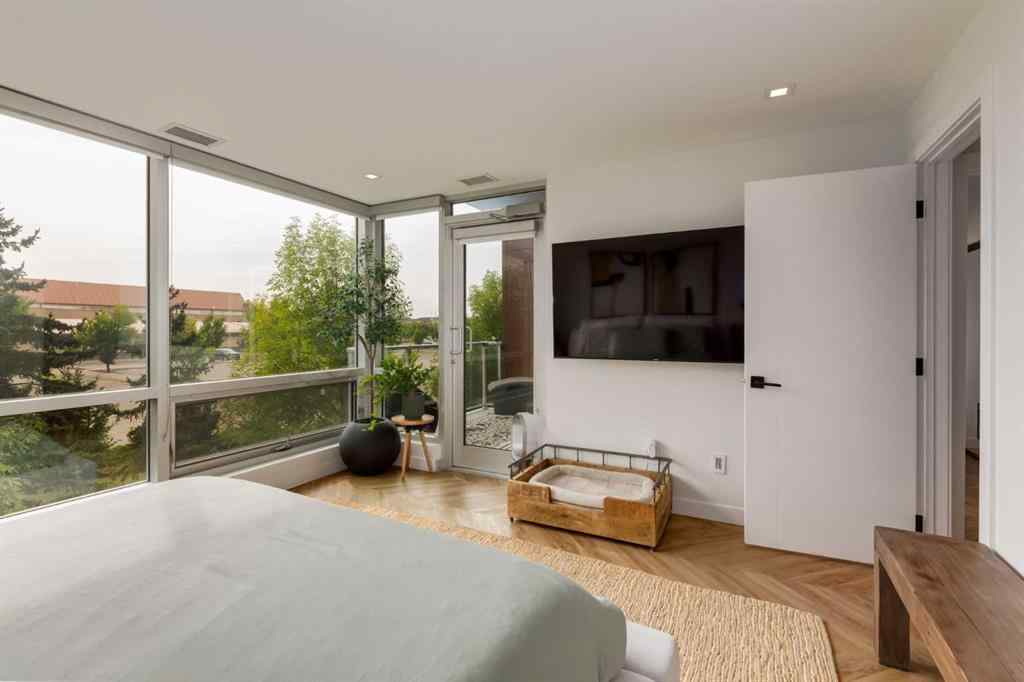 MLS® A2256289 - Unit #110 8445 Broadcast Avenue SW in West Springs Calgary, Residential