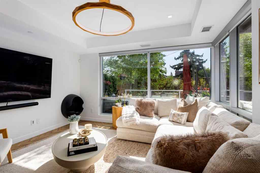 MLS® A2256289 - Unit #110 8445 Broadcast Avenue SW in West Springs Calgary, Residential