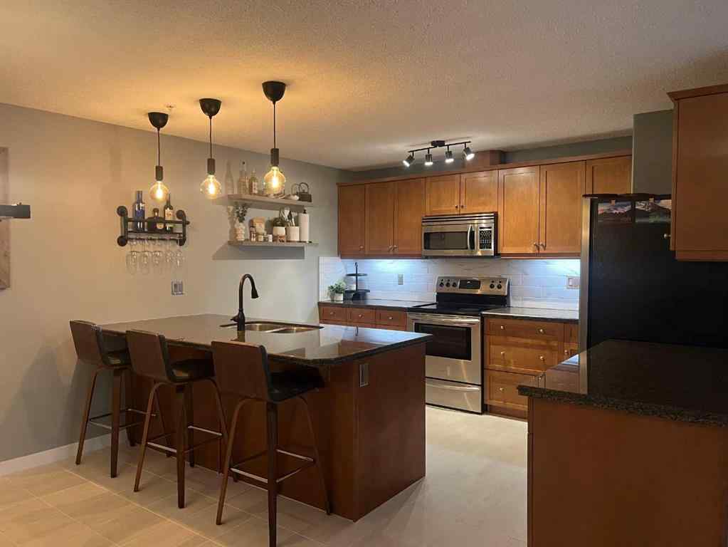 MLS® A2256302 - Unit #109 150 Crossbow Place  in Three Sisters Canmore, Residential