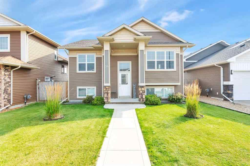MLS® A2256305 - 34 Iron Wolf Court  in Iron Wolf Lacombe, Residential