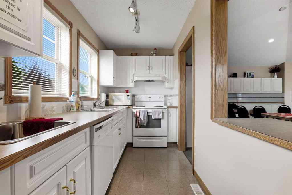 MLS® A2256306 - Unit #30 1008 Woodside Way NW in Woodside Airdrie, Residential