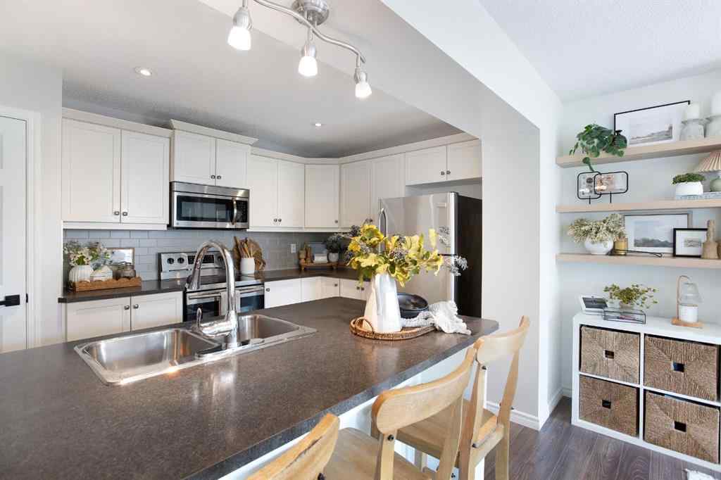 MLS® A2256322 - 420 Windstone Grove SW in Windsong Airdrie, Residential