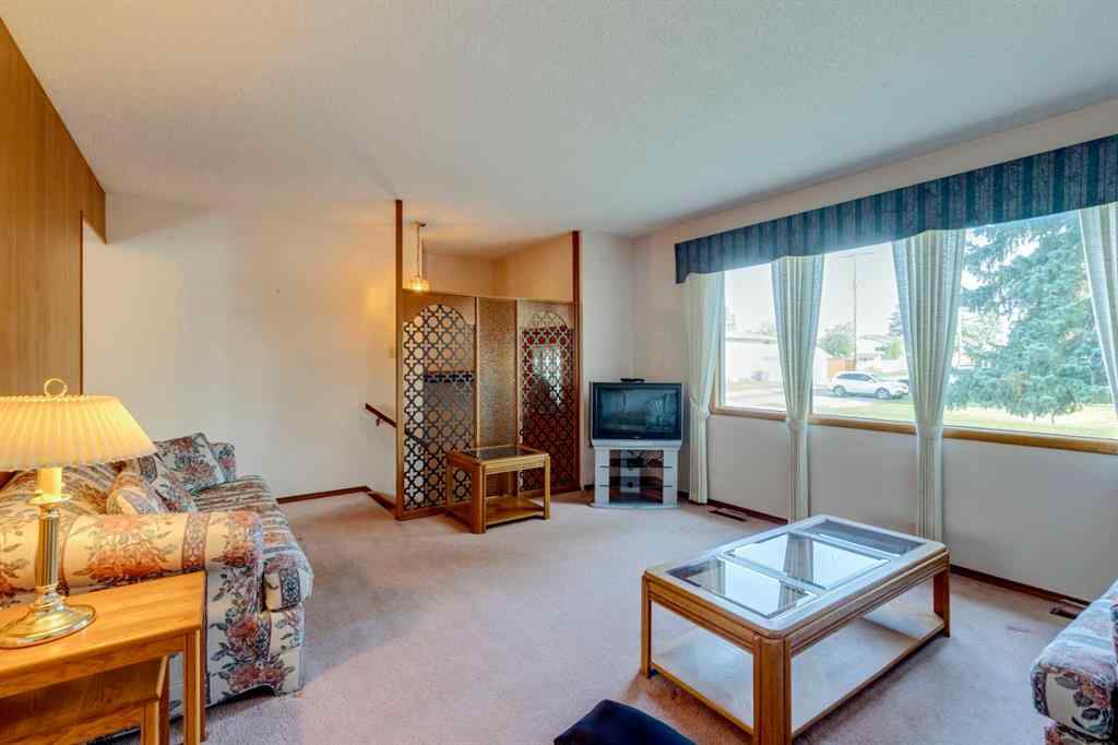 MLS® A2256343 - 9720 Academy Drive SE in Acadia Calgary, Residential