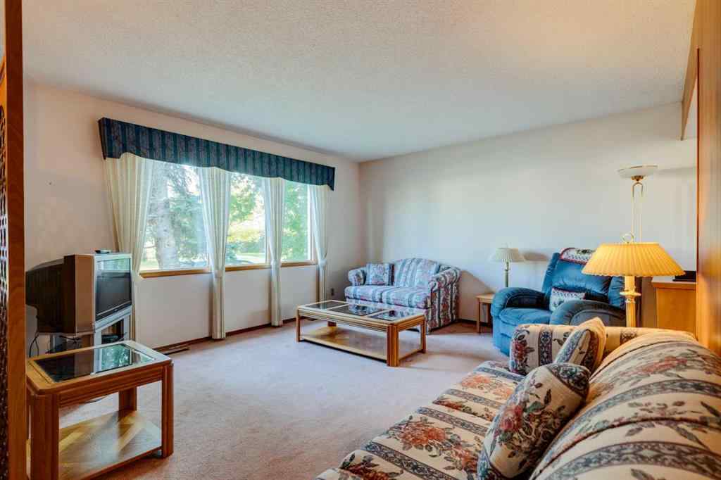 MLS® A2256343 - 9720 Academy Drive SE in Acadia Calgary, Residential