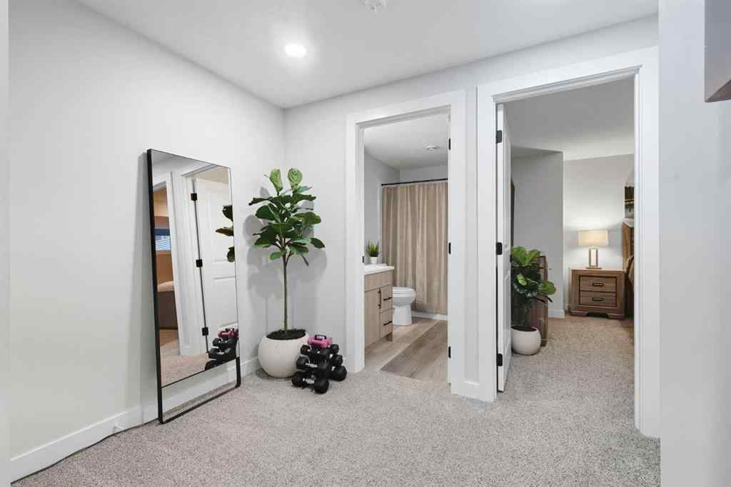 MLS® A2256351 - 305 Sundown Road  in Sunset Ridge Cochrane, Residential