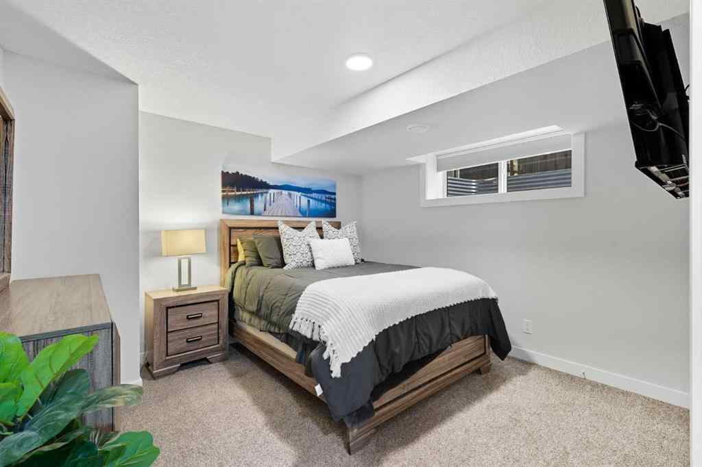 MLS® A2256351 - 305 Sundown Road  in Sunset Ridge Cochrane, Residential
