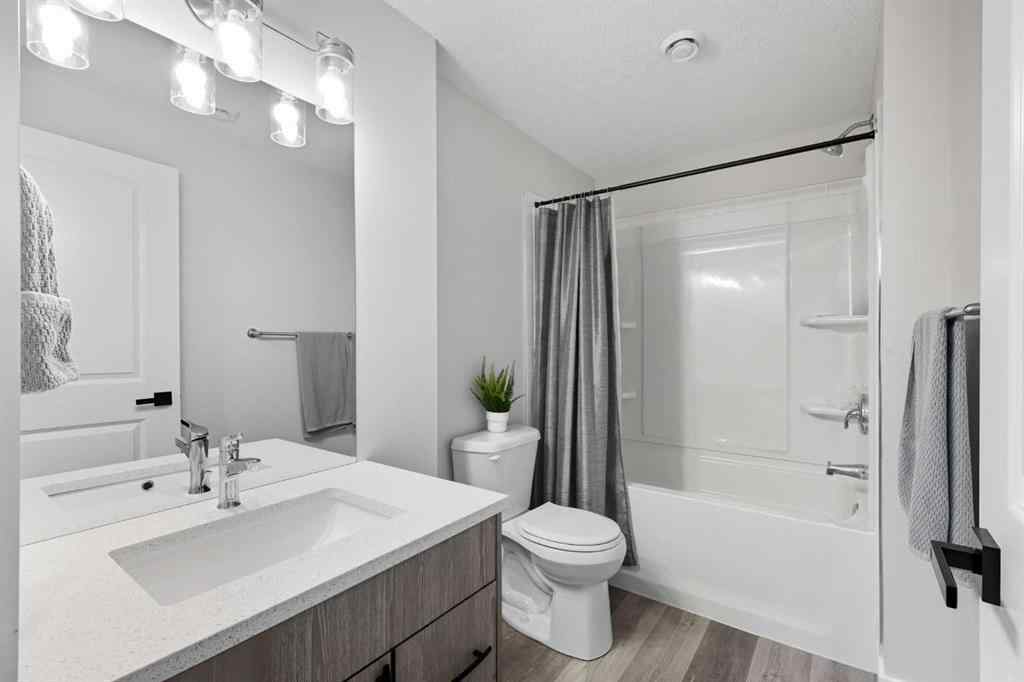 MLS® A2256351 - 305 Sundown Road  in Sunset Ridge Cochrane, Residential