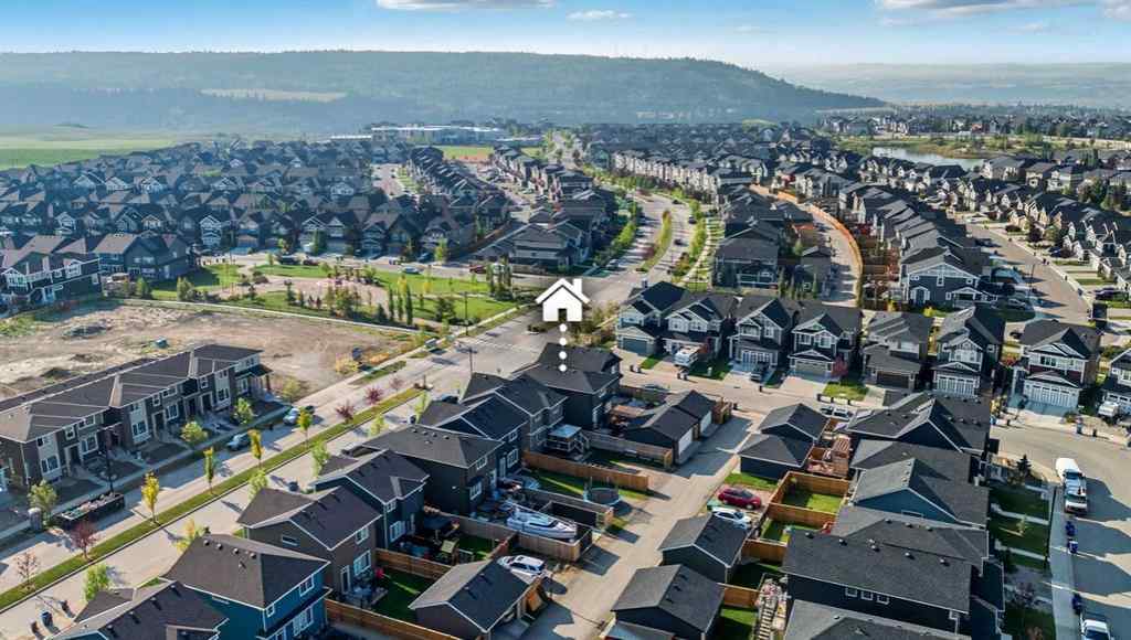 MLS® A2256351 - 305 Sundown Road  in Sunset Ridge Cochrane, Residential