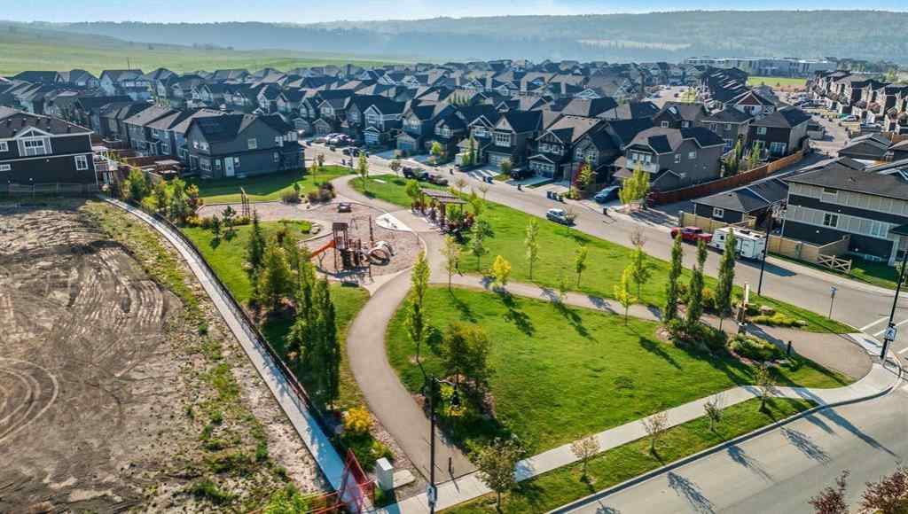 MLS® A2256351 - 305 Sundown Road  in Sunset Ridge Cochrane, Residential