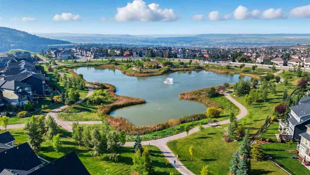 MLS® A2256351 - 305 Sundown Road  in Sunset Ridge Cochrane, Residential