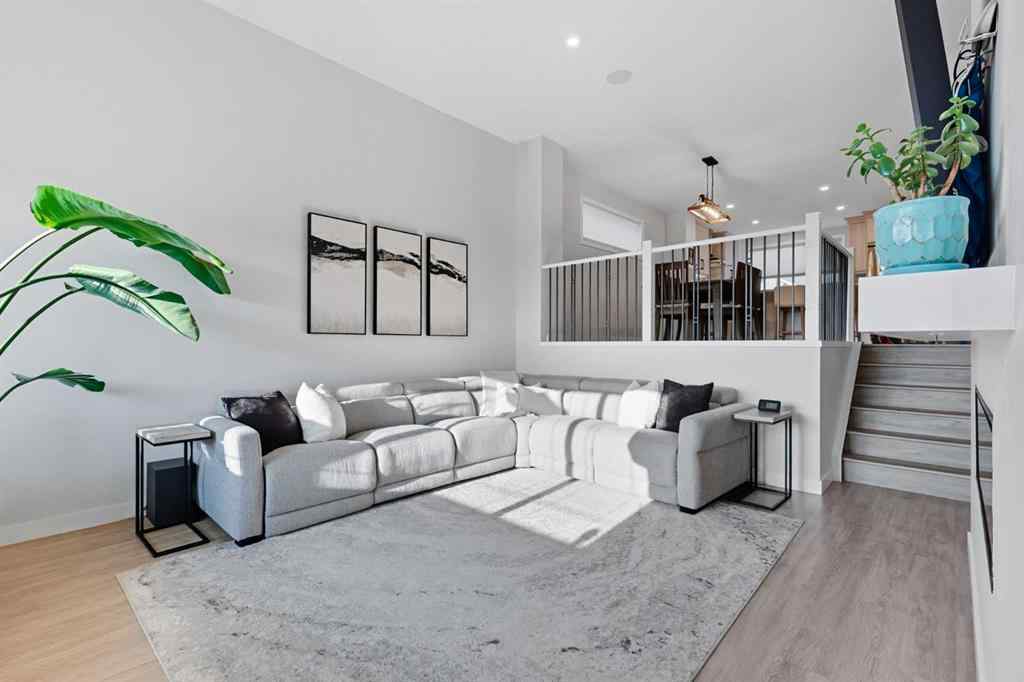 MLS® A2256351 - 305 Sundown Road  in Sunset Ridge Cochrane, Residential