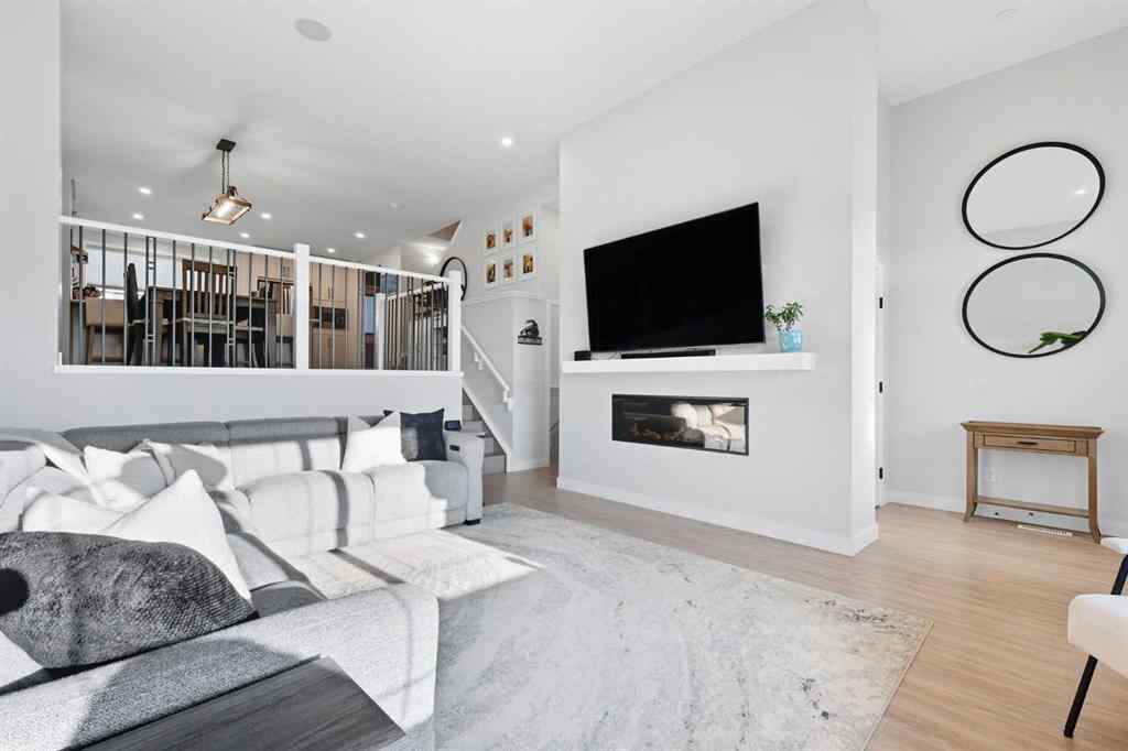 MLS® A2256351 - 305 Sundown Road  in Sunset Ridge Cochrane, Residential