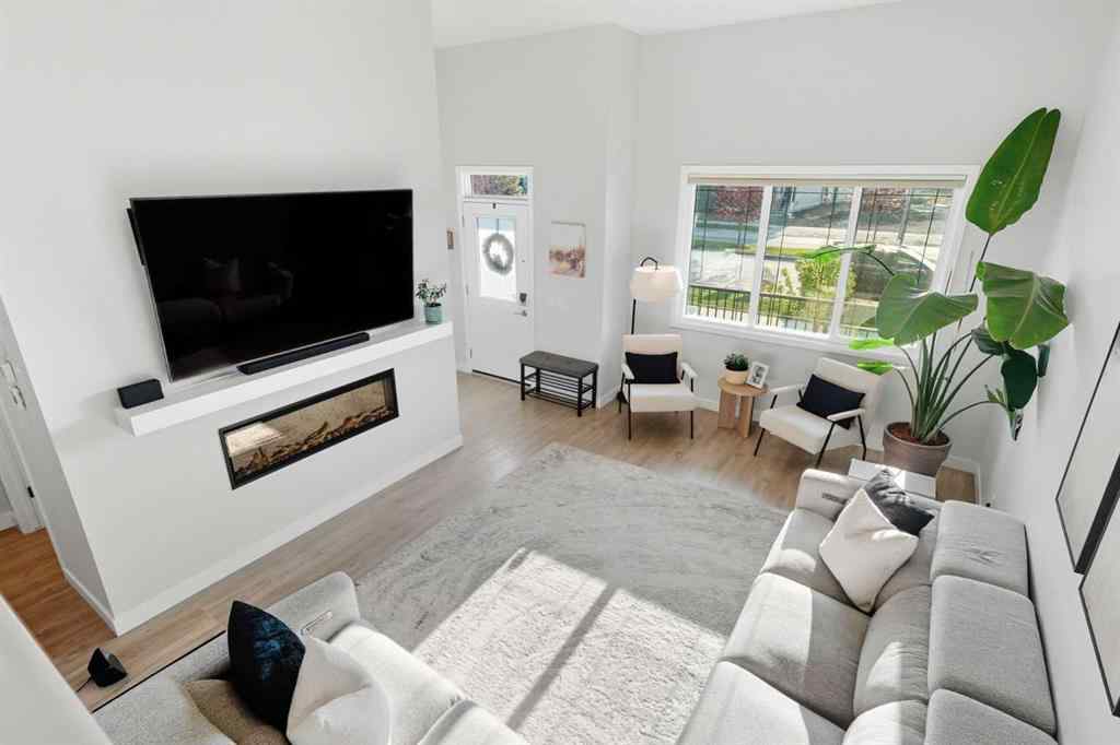 MLS® A2256351 - 305 Sundown Road  in Sunset Ridge Cochrane, Residential
