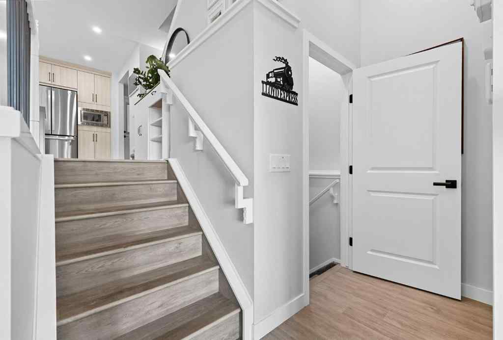 MLS® A2256351 - 305 Sundown Road  in Sunset Ridge Cochrane, Residential