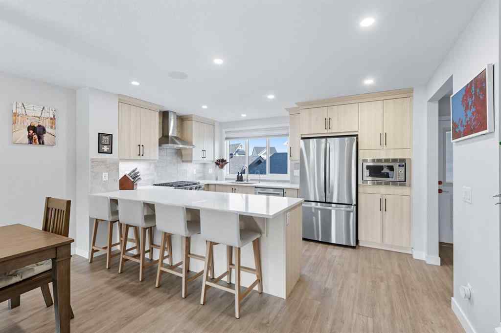 MLS® A2256351 - 305 Sundown Road  in Sunset Ridge Cochrane, Residential