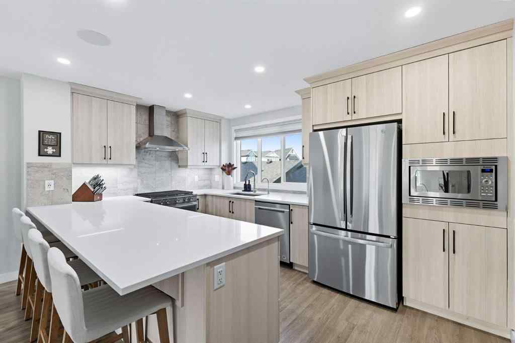 MLS® A2256351 - 305 Sundown Road  in Sunset Ridge Cochrane, Residential