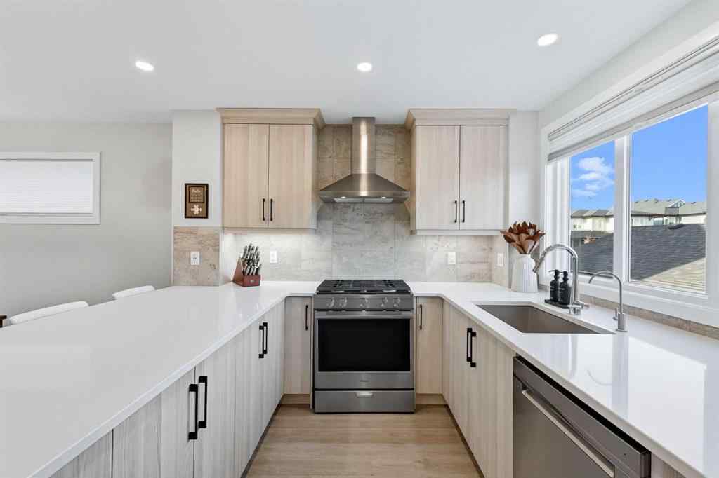 MLS® A2256351 - 305 Sundown Road  in Sunset Ridge Cochrane, Residential