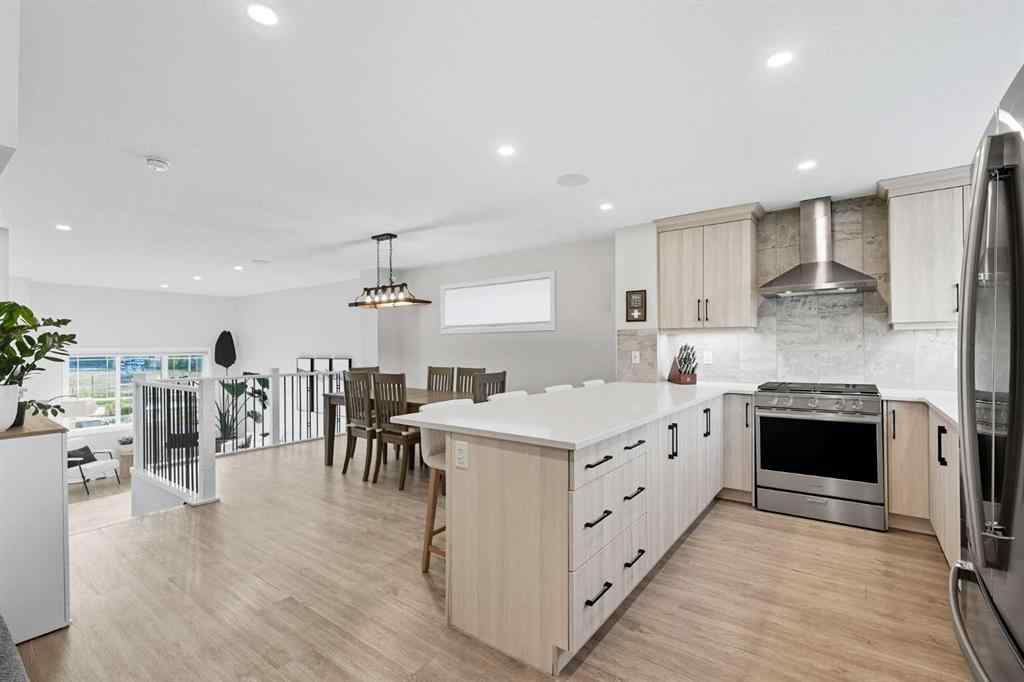 MLS® A2256351 - 305 Sundown Road  in Sunset Ridge Cochrane, Residential
