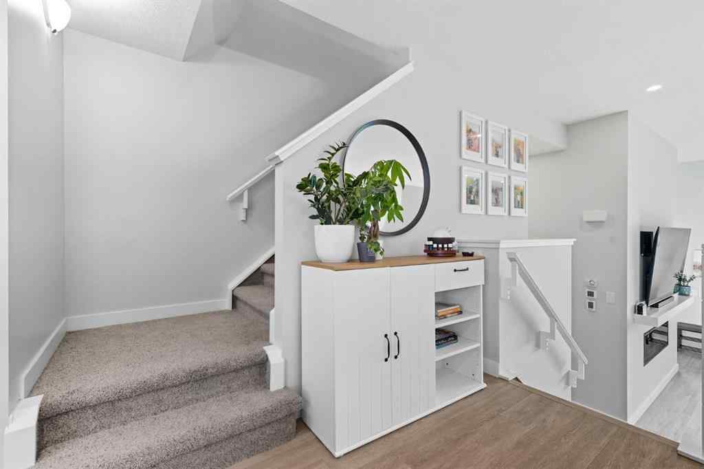 MLS® A2256351 - 305 Sundown Road  in Sunset Ridge Cochrane, Residential