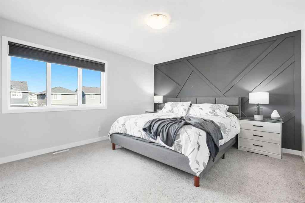 MLS® A2256351 - 305 Sundown Road  in Sunset Ridge Cochrane, Residential