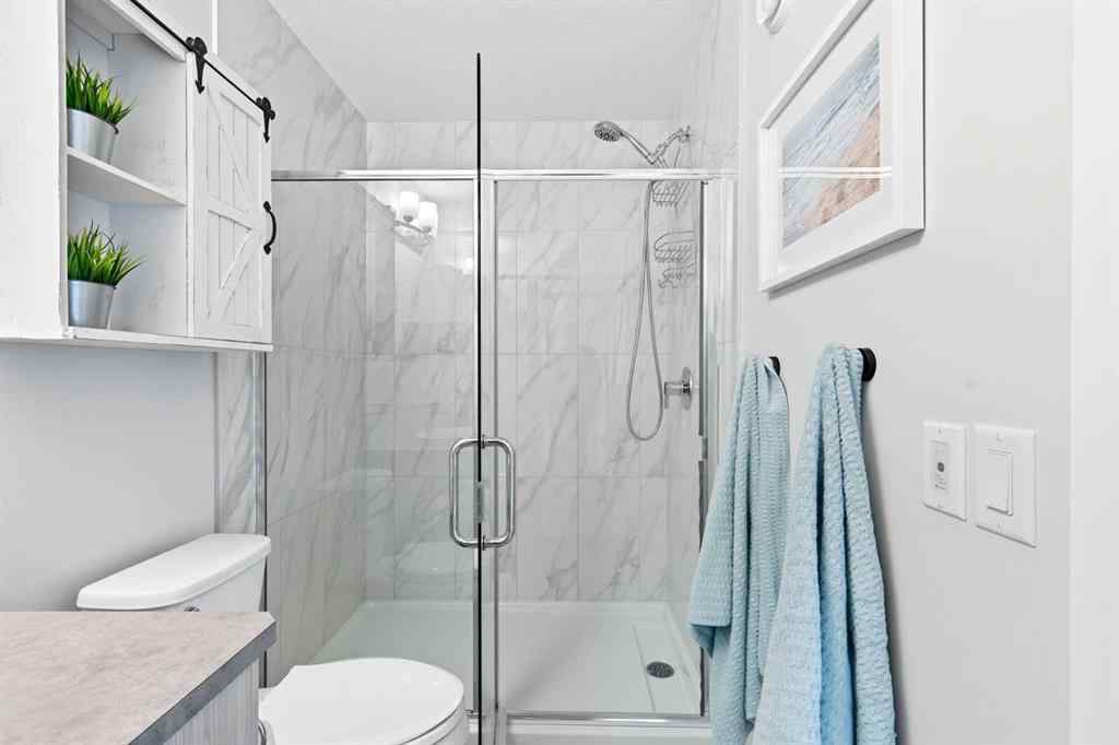 MLS® A2256351 - 305 Sundown Road  in Sunset Ridge Cochrane, Residential