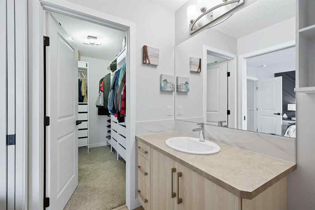 MLS® A2256351 - 305 Sundown Road  in Sunset Ridge Cochrane, Residential