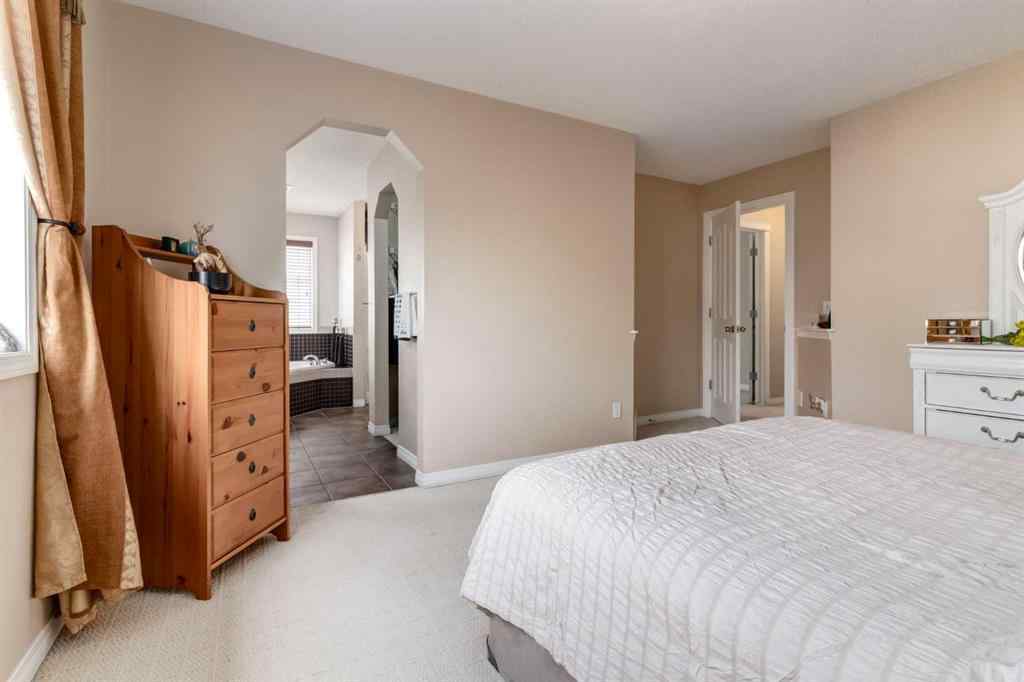 MLS® A2256377 - 82 Everglen Crescent SW in Evergreen Calgary, Residential