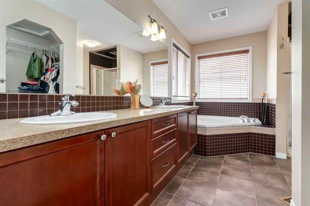 MLS® A2256377 - 82 Everglen Crescent SW in Evergreen Calgary, Residential