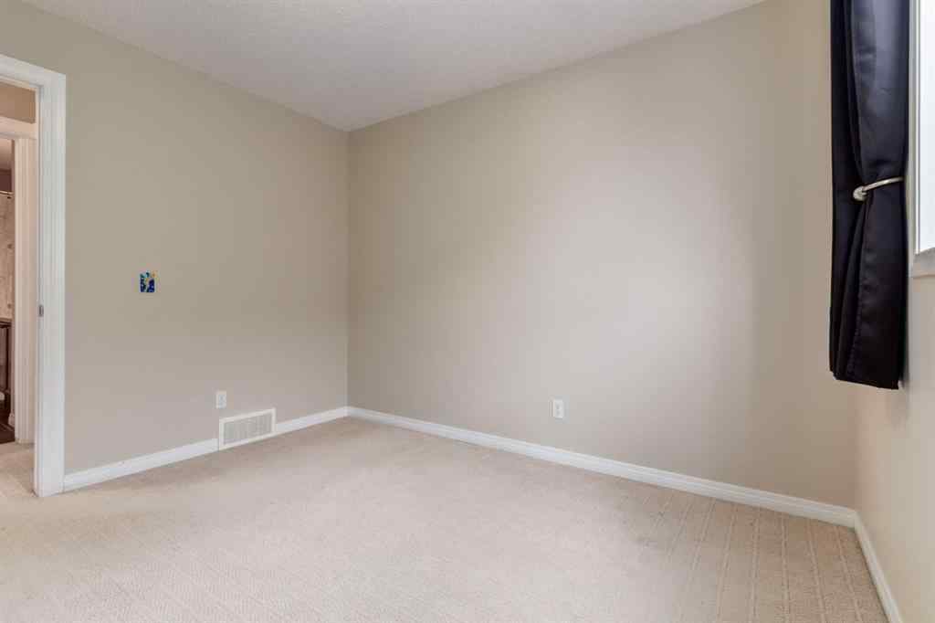 MLS® A2256377 - 82 Everglen Crescent SW in Evergreen Calgary, Residential