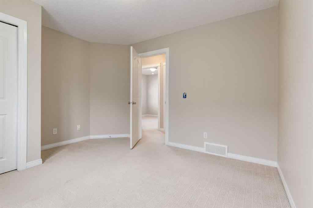 MLS® A2256377 - 82 Everglen Crescent SW in Evergreen Calgary, Residential