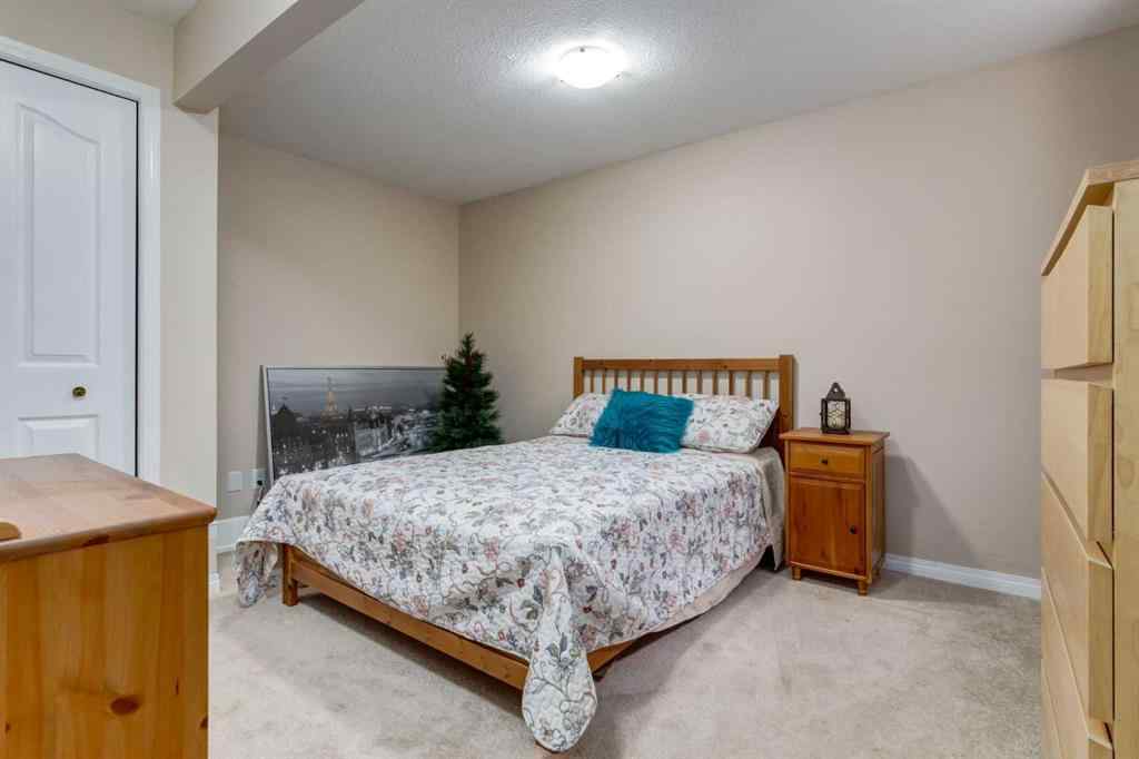 MLS® A2256377 - 82 Everglen Crescent SW in Evergreen Calgary, Residential