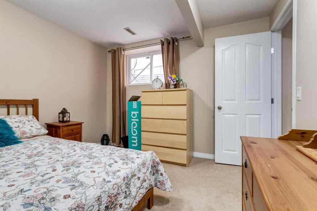 MLS® A2256377 - 82 Everglen Crescent SW in Evergreen Calgary, Residential