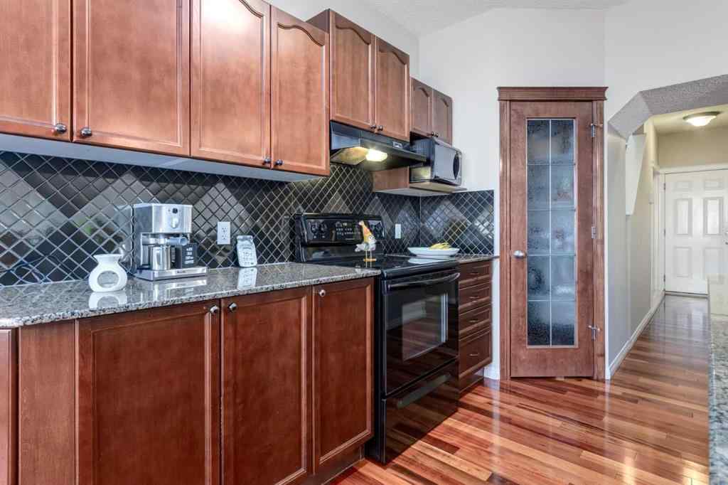 MLS® A2256377 - 82 Everglen Crescent SW in Evergreen Calgary, Residential