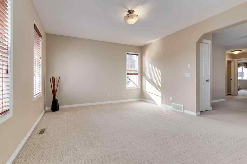 MLS® A2256377 - 82 Everglen Crescent SW in Evergreen Calgary, Residential